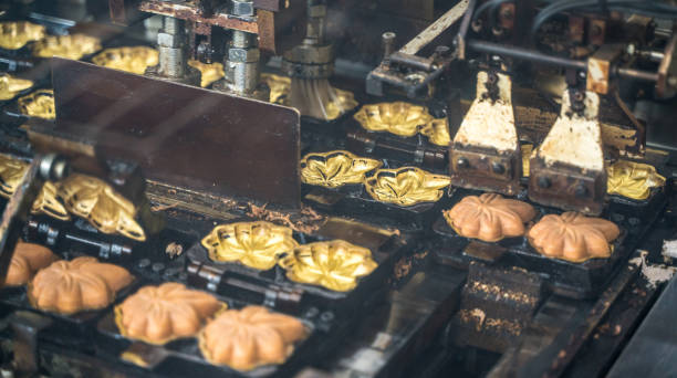 Automatic manufacture of Momiji Manju(Japanese sweets in a maple shape)